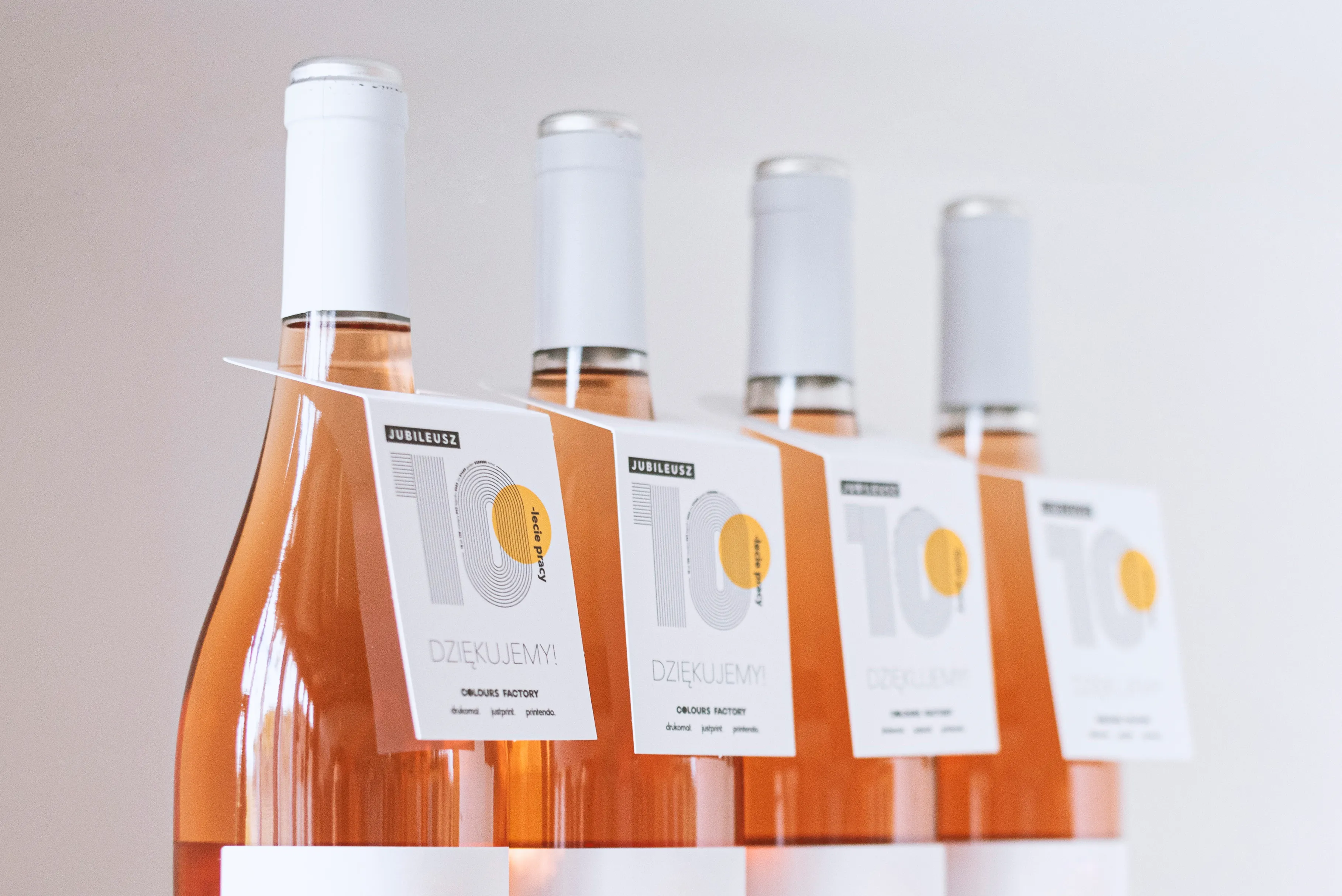 photo of a hangers on wine bottles